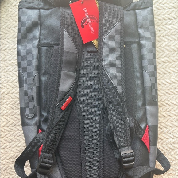Black Checkered Backpack with Red Accents Sprayground